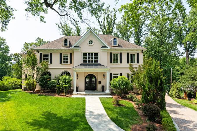 Residential home exterior with landscaped yard