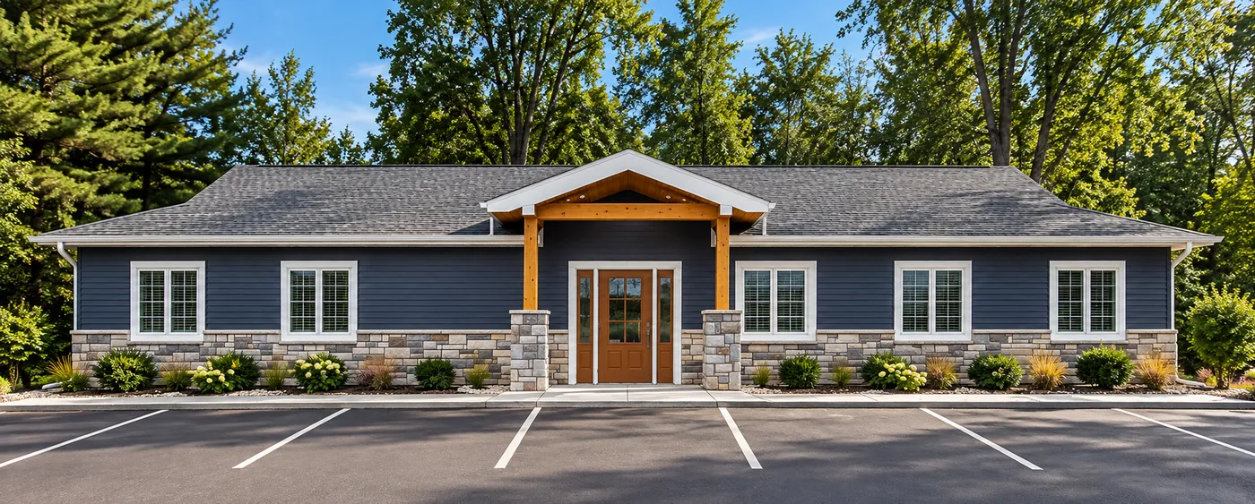 The Davis and Associates office on Portage Road, a single-storey building with a timber entry porch.